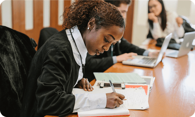 A student at Knovva’s Model G20 student leadership summit writes her final position paper on climate change.